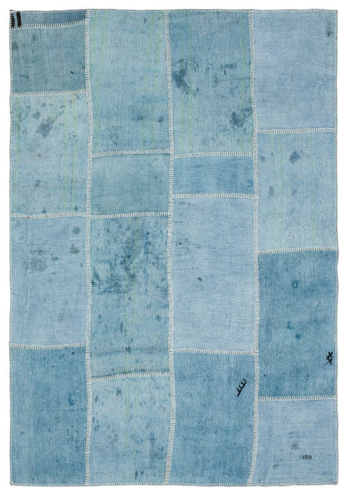 Teselya Turquoise Patchwork Wool Handmade Area Rug 5'2" x 7'6"